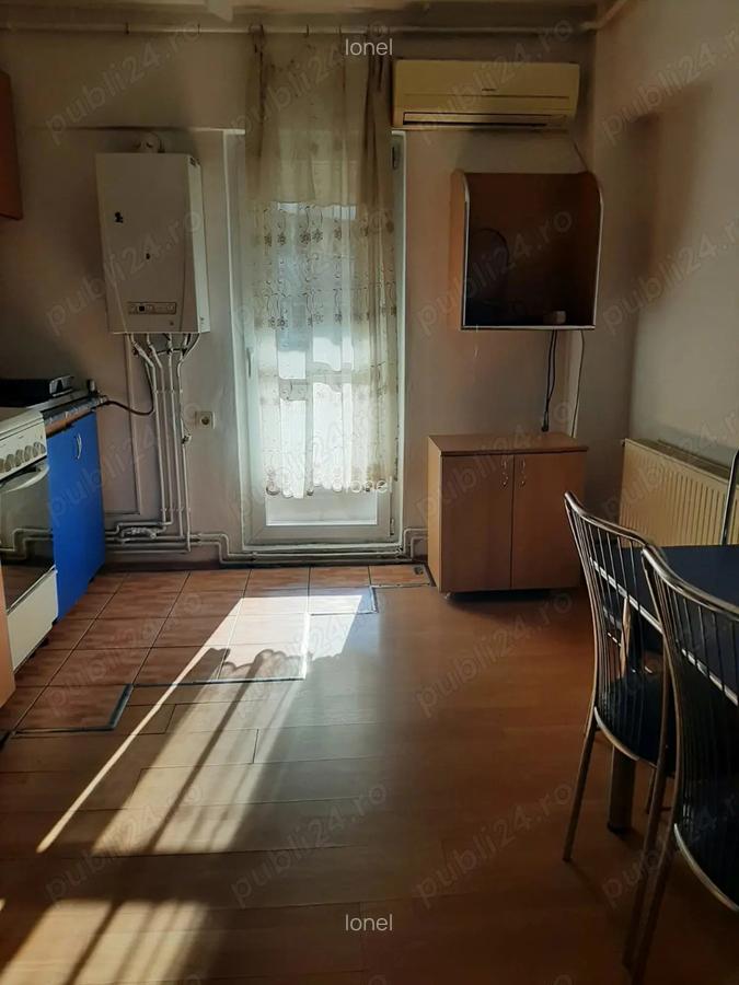 Apartament de inchiriat, peste strada de CN Spiru Haret - 6
