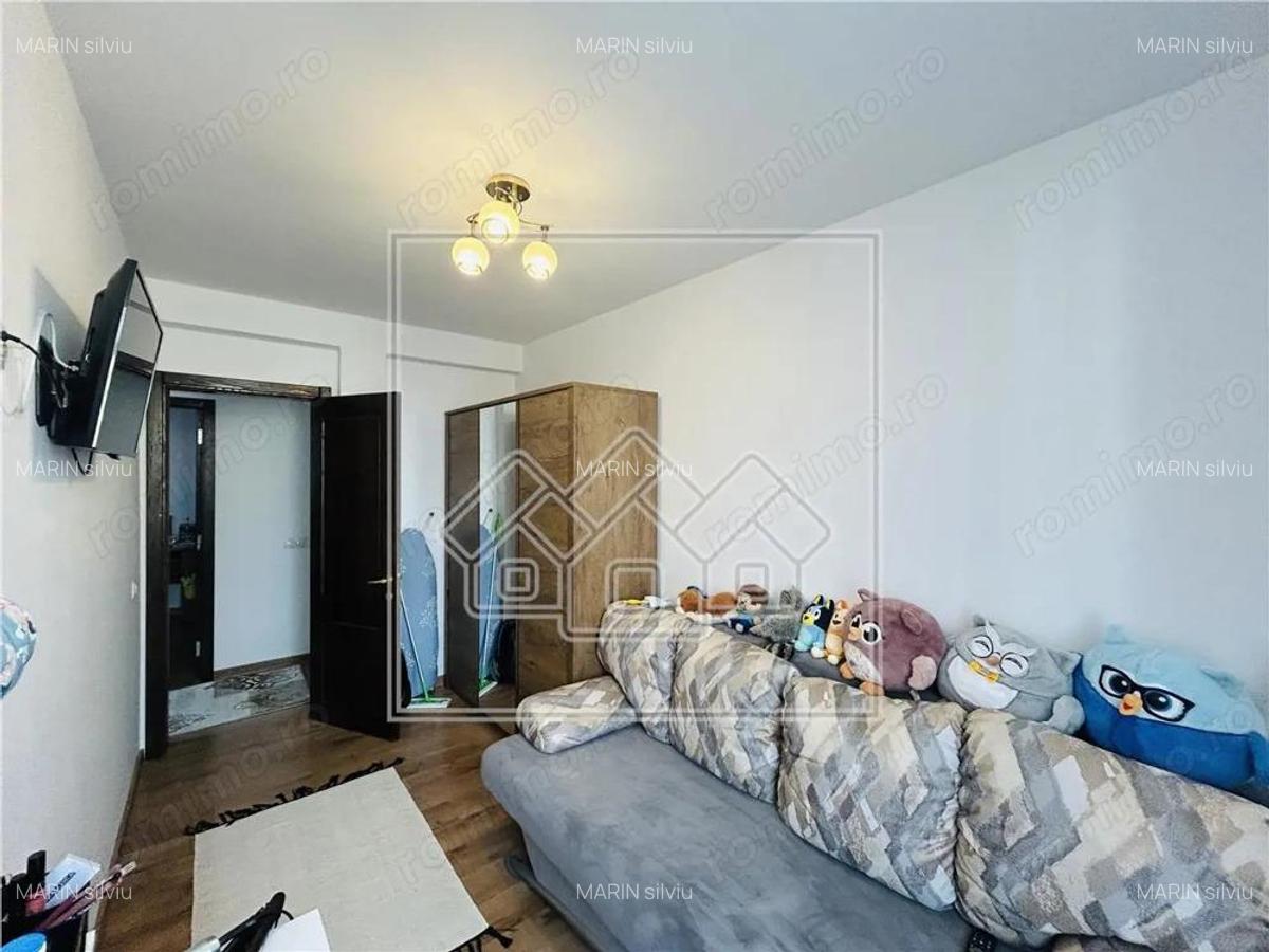 Casa cu 82 mp utili, gradina de 30 mp, Calea Cisnadiei - 11