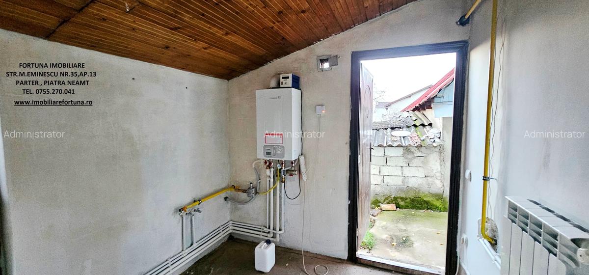 Casa individuala,cu 2 beciuri, anexe si 920 mp teren,la 10 minute de P.Neamt - 12