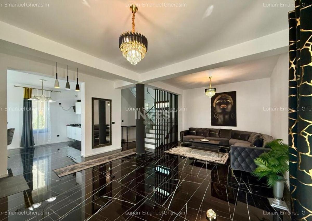 Vila de vanzare cu design deosebit in cartierul Bucium - 1