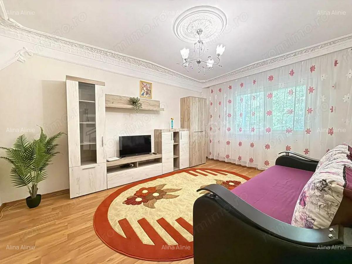Apartament cu 2 camere, 2 bai, decomandat - zona Racadau - 1