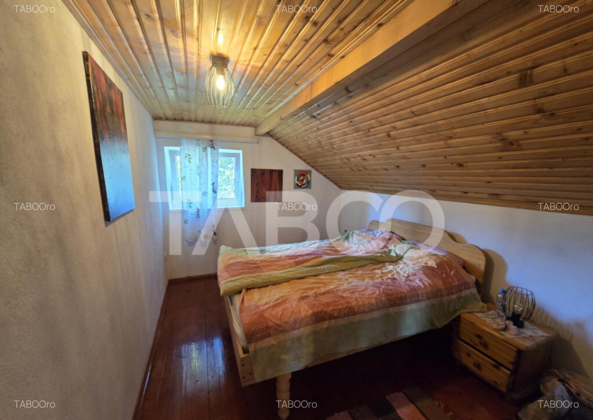 Casa de vanzare 3 camere 64 mpu 900 mp teren in Tocile - 2
