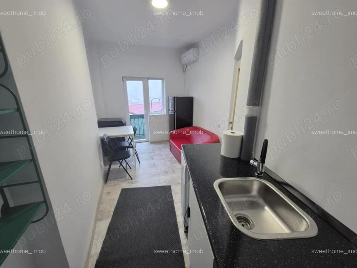 Calea Calarasi-Traian garsoniera la prima inchiriere cu centrala - 12