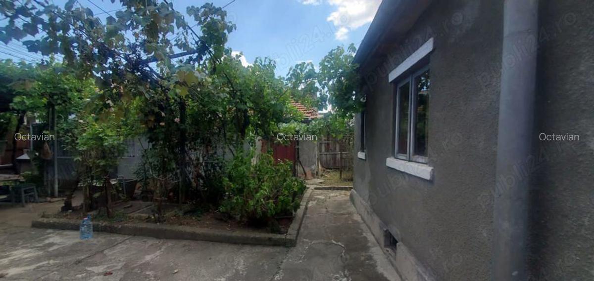 Casa amplasata pe un teren de 280mp cu potential comercial pe str Orly - 1