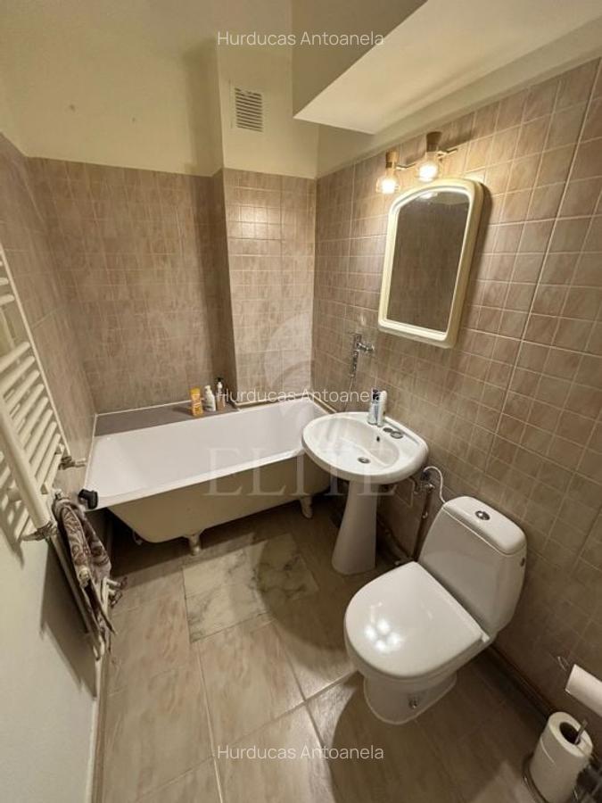 Apartament cu 3 camere semidecomandat, mobilat în Central - 11