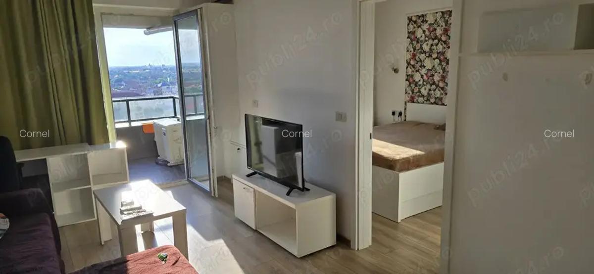 Lux la inaltime , apartament 2 camere la etajul 10 11 situat in Arad in complexul ADORA - 4