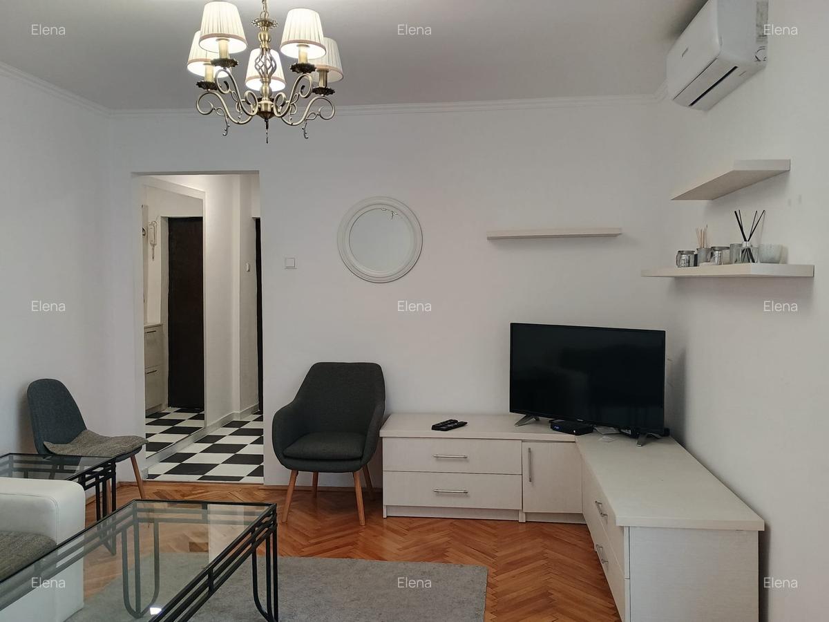Magheru 2 camere renovat complet si mobilat - 8