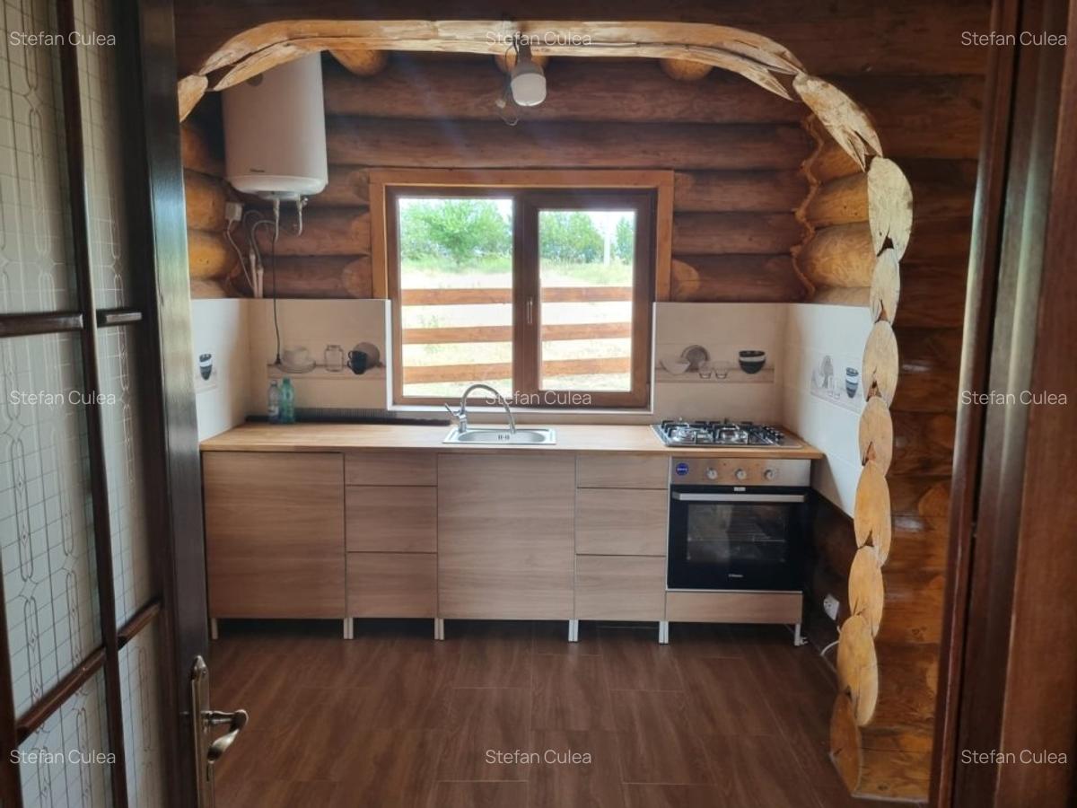 Casa modernizată în 2024 din bușteni de brad - 9 Casa modernizată în 2024 din bușteni de brad - 9