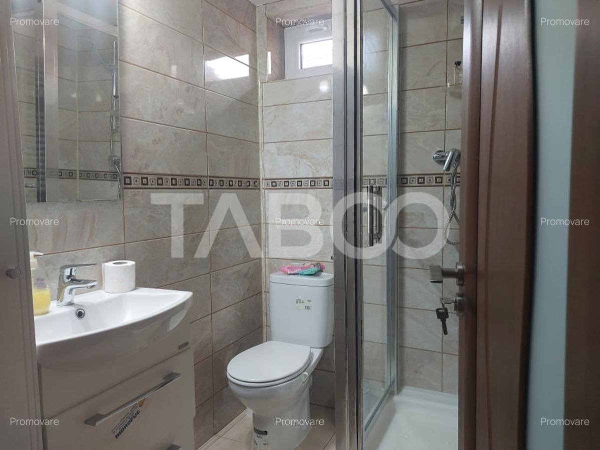 Apartament la casa 97 mpu 5 camere 2 bucatarii 3 bai gradina Cisnadie - 9