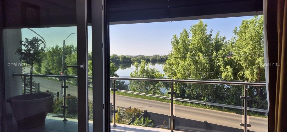 Casa 5 camere, 3 bai, 3 locuri de parcare, teren 302 mp, Tunari, vedere la lac - 6