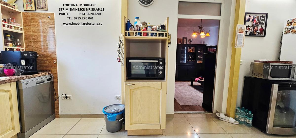 Locuinta individuala(apartament 4 camere)+spatiu comercial si teren ,Darmanesti - 4