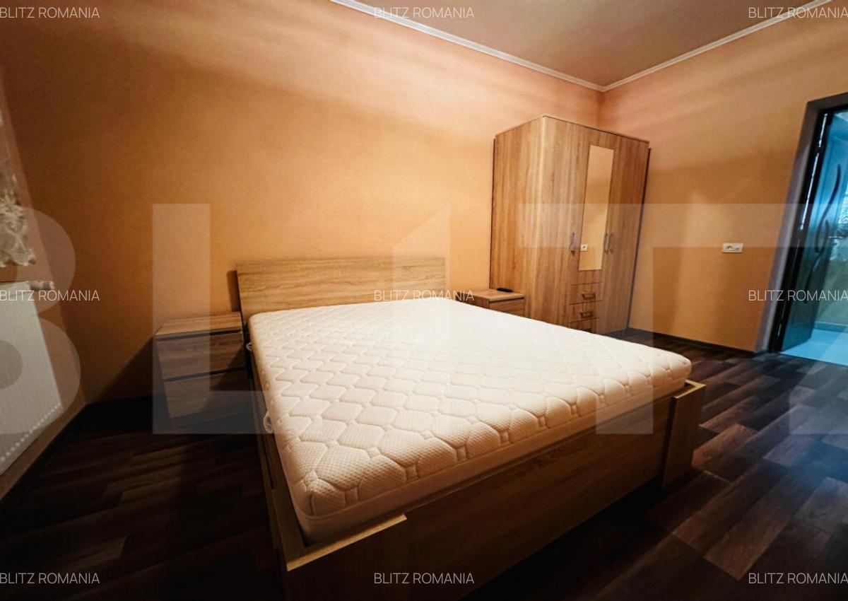 Casa spatioasa cu 5 dormitoare, doua bucatarii si teren de 1 - 10