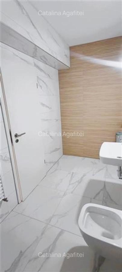 Apartament cu 3 camere decomandat în Tractorul - 14