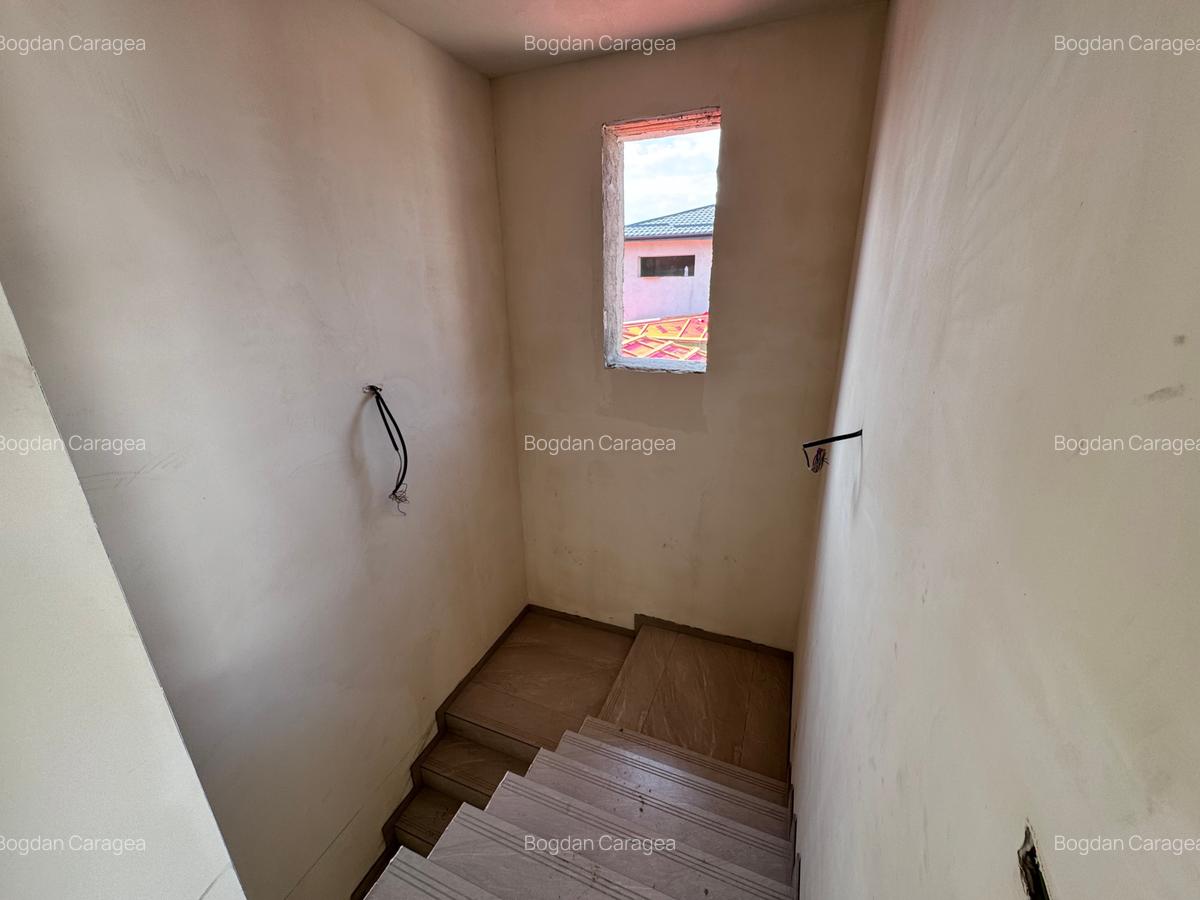 Casa individuala P+1+Pod. 5 cam. Util 160mp. Teren 390mp - 15
