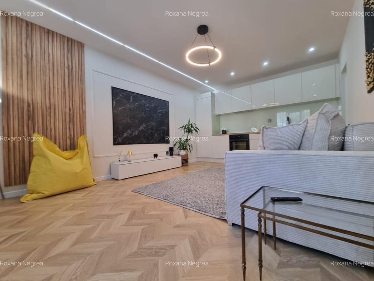 Apartament  cu 2 camere, ultrafinisat, zona semicentrala, etaj intermediar - 7