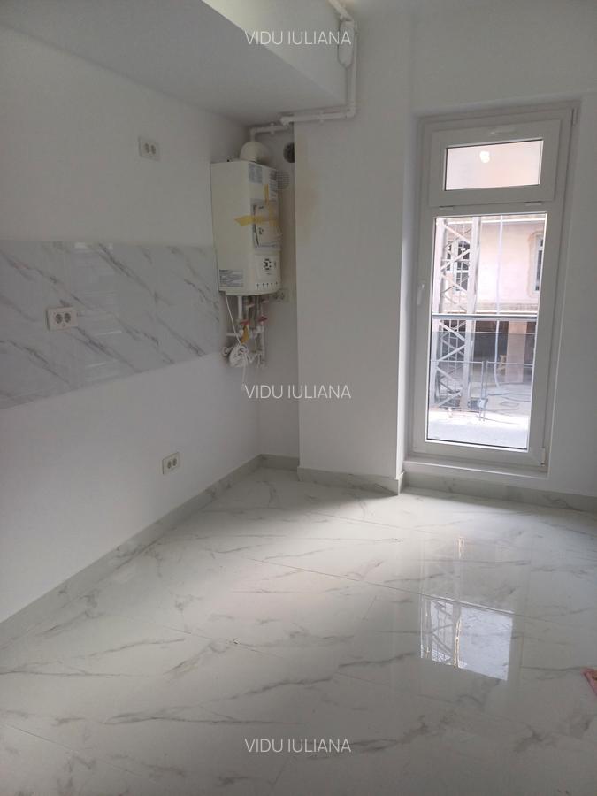 Apartament cu 2 camere decomandat în Prelungirea Ghencea - 12