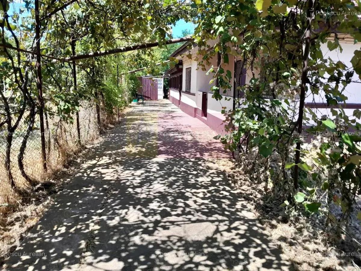 Movilita - vanzare casa 5 cam plus livada pe rod si teren 1800 mp - 6