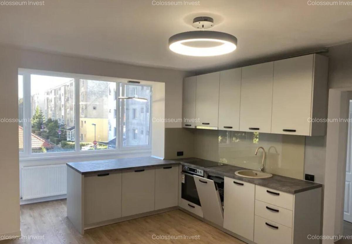 Apartament 3 camere, decomandat - zona Tractorul - 1