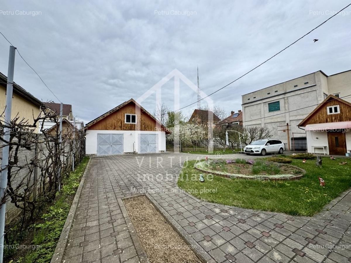 Casa individuala cu 6 camere + demisol 94mp utili, teren 972mp, garaje - 2