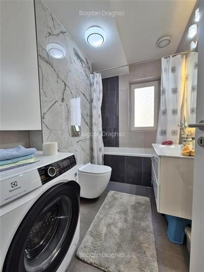 Apartament cu 2 camere decomandat, mobilat în Tractorul - 4