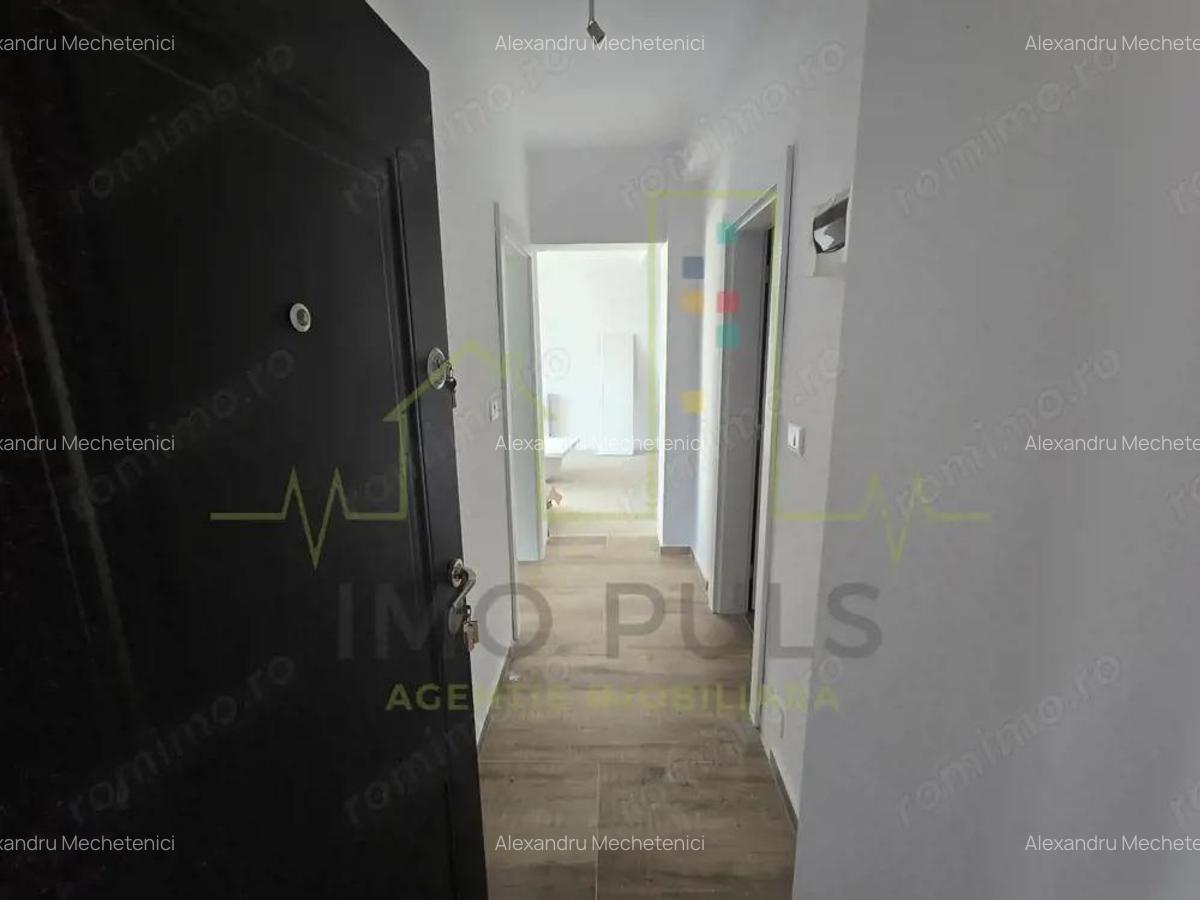 Apartament la parter cu balcon. Bucatarie separata. Loc de parcare - 5