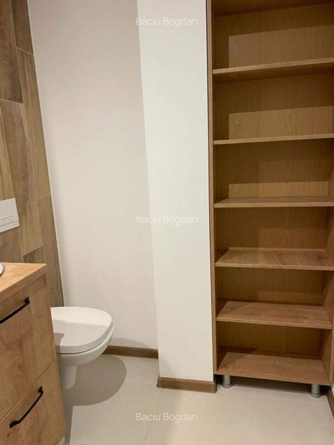 Vand apartament cu 5 camere si curte: 4 dormitoare, 3 bai - Tractoru - 7