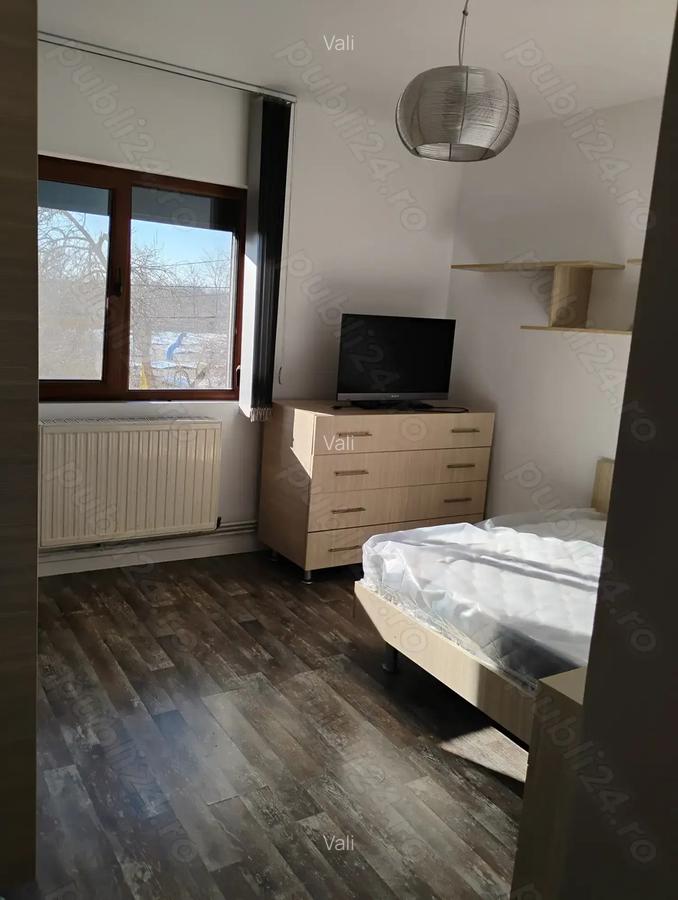 Inchiriez apartament cu 2 camere decomandat etaj 1 - 8