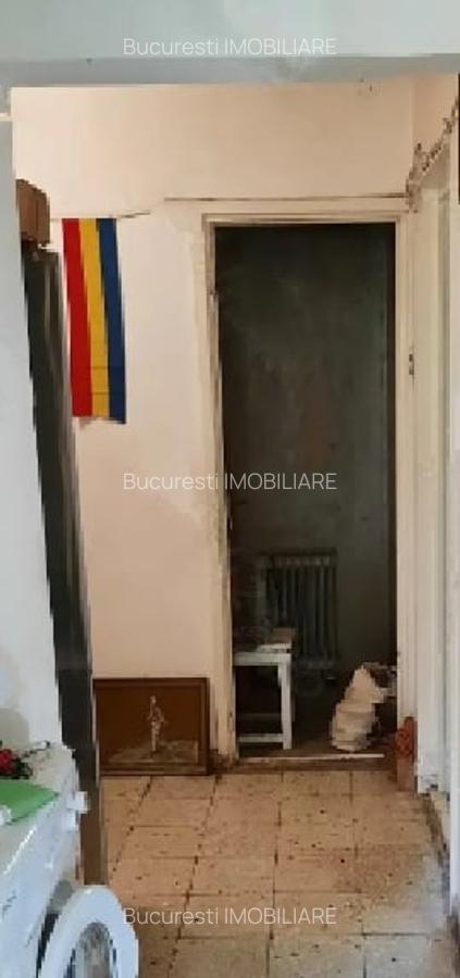 1 Decembrie 1918 Ozana, decomandat, 2/4, balcon inchis,stradal,bucatarie mare. - 4