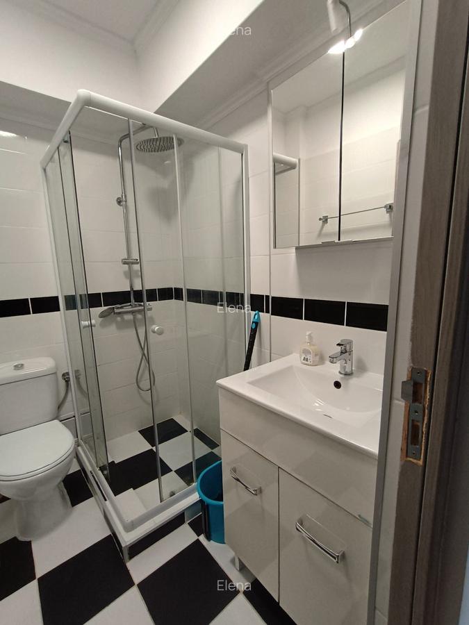 Magheru 2 camere renovat complet si mobilat - 14