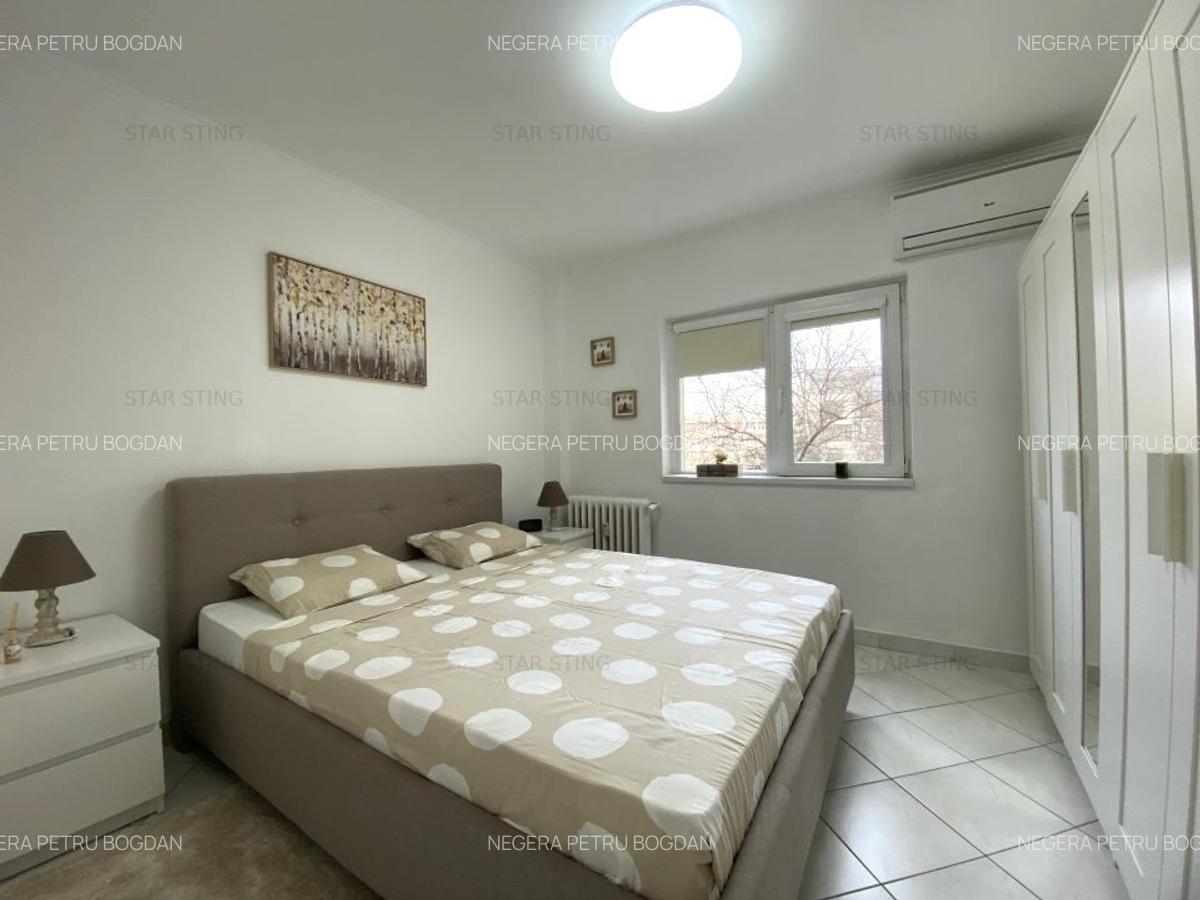 Romana,renovat nou,curat,cu spatii de depozitare. - 6