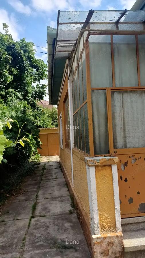 Casa individuala pe parter - 124 mp, 4 camere, anexe si garaj, teren 614 mp, -Str.Dr.I.Muresan - 3
