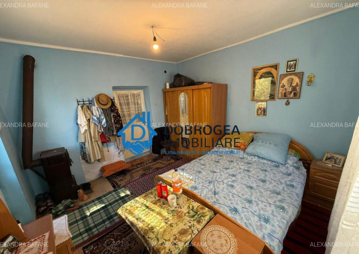 Caslita - teren 513 mp, pomi fructiferi, casa 2 camere - 12