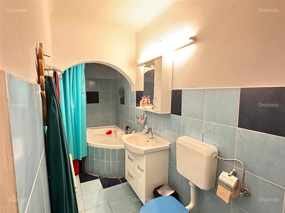 Casa batraneasca, zona  Buna Vestire  Ploiesti, teren 175 mp,renovata in 2004 - 8