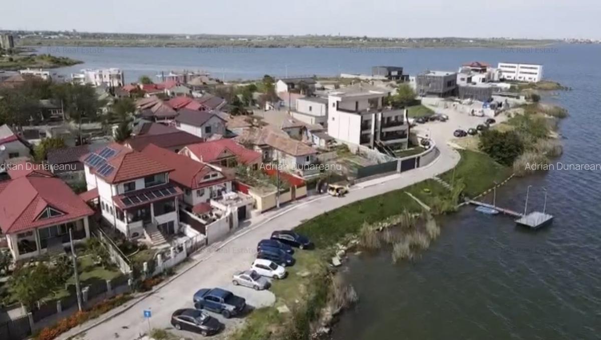Teren cu localizare privilegiata pe malul lacului intr-o peninsula privata - 2