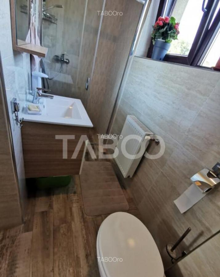Casa de vanzare cu 4 camere decomandate si garaj in Cisnadie - 30