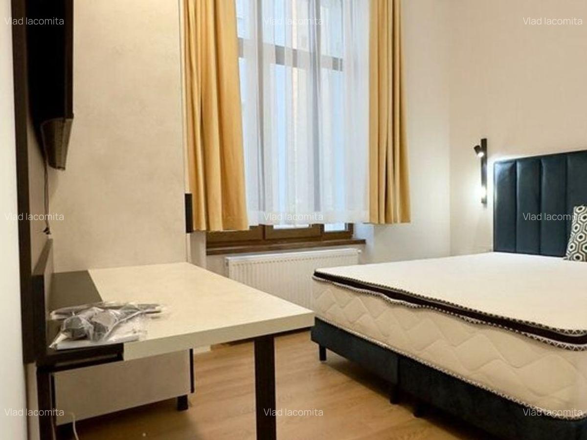 Magheru: 5 camere cu băi proprii - business regim hotelier care deja produce. - 13