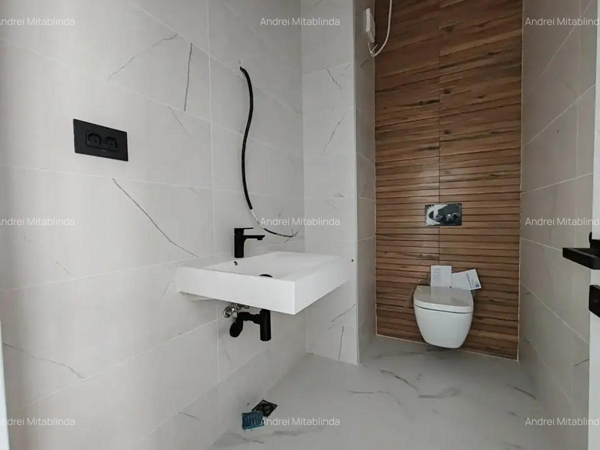 Apartament cu 5 camere decomandat în Titan - 14