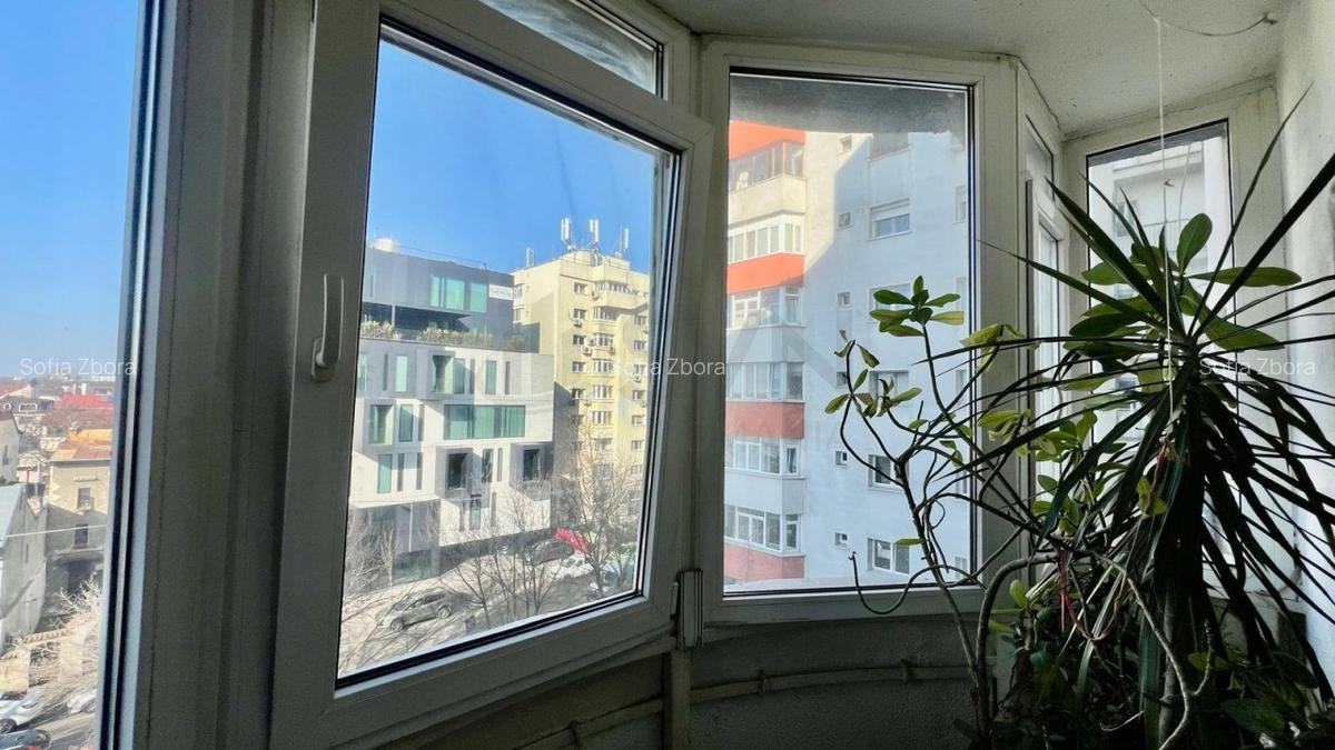 Garsonieră decomandată în P-ța Victoriei - 12