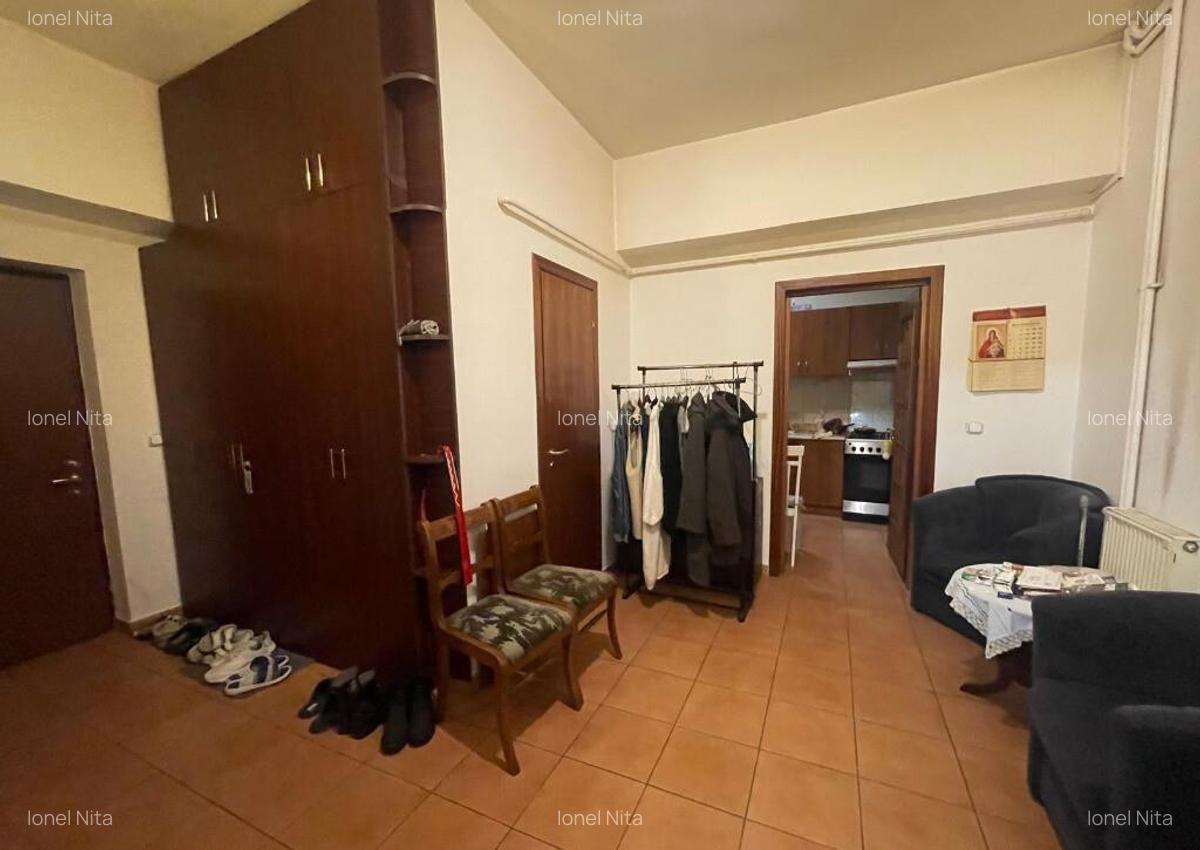 P-ta Victoriei,ap.3 cam,an 1997,dec,suprf.128mp,loc parcare subteran - 12