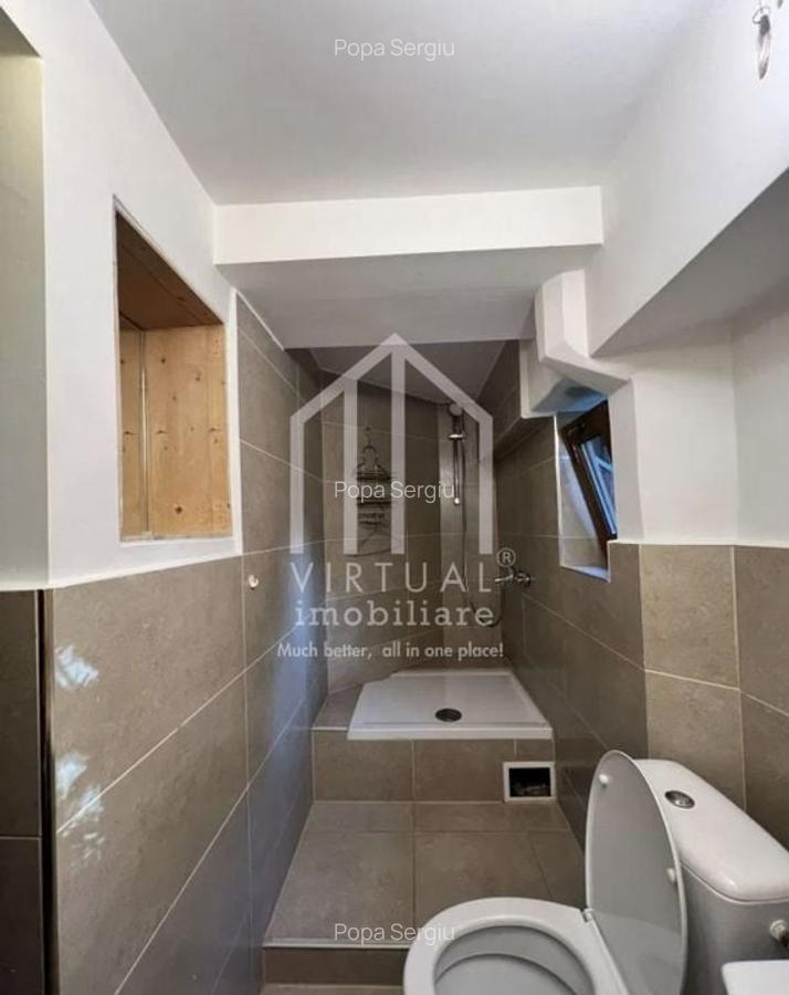 Casa formata din 2 apartamente, 2 garaje,  3 bai - zona Trei Stejari - 14