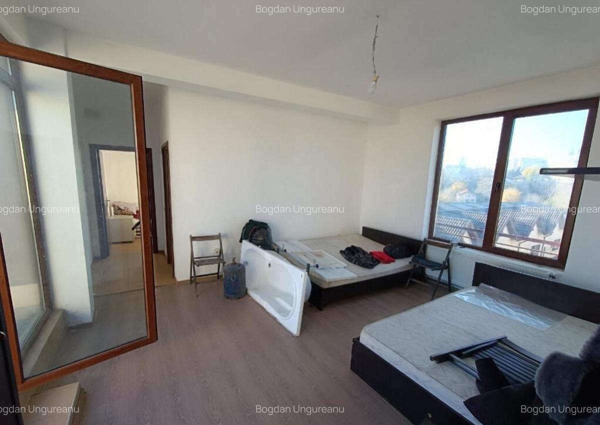 Garsoniera 40 mp utili + Terasa 48.5 mp - Zona Sfinti - 4