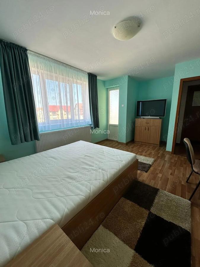 Locuin?a spa?ioasa, situata intr-o zona buna,cu camere luminoase ?i separate,complet mobilata. - 6