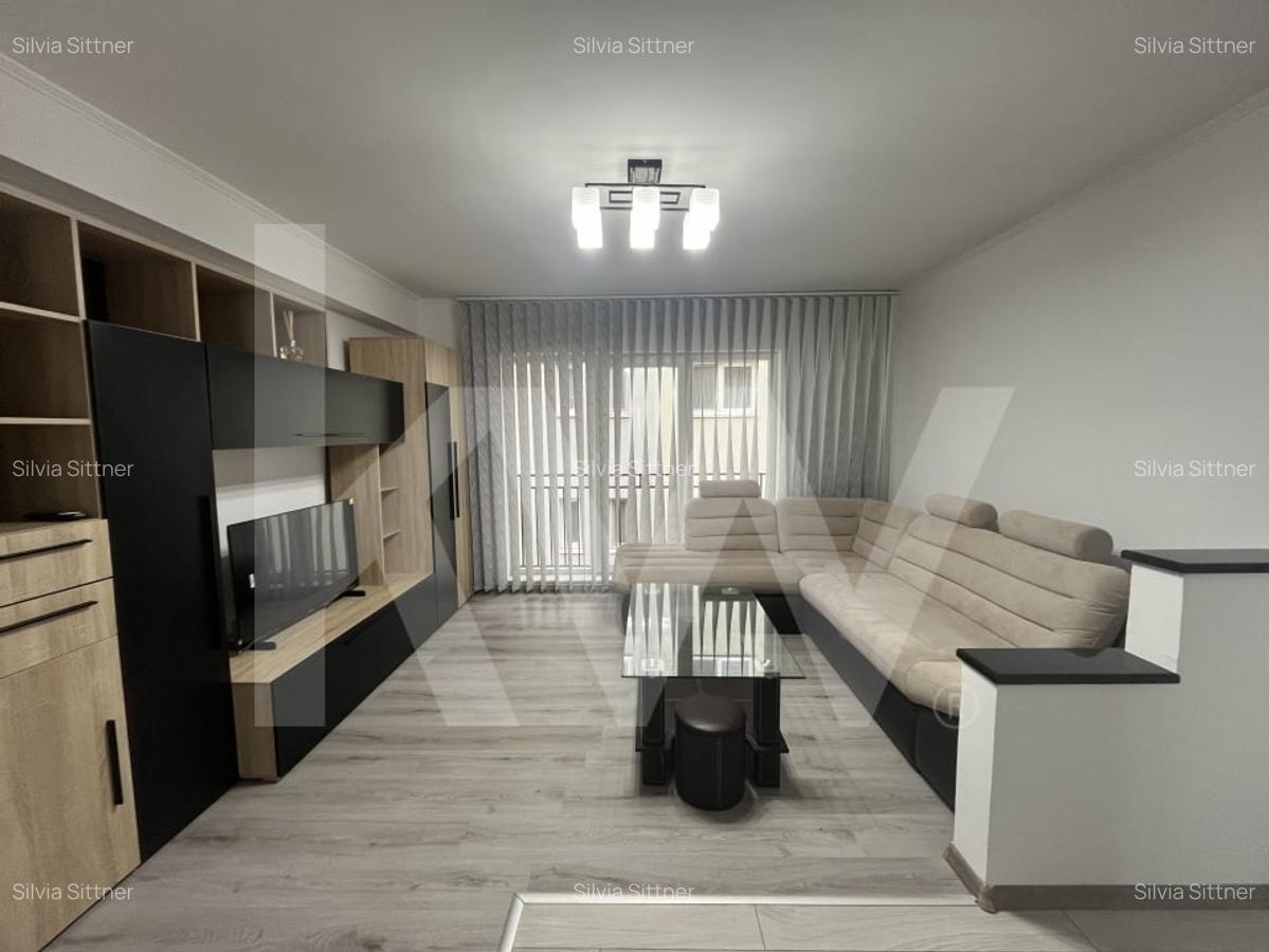 2 dormitoare, living generos si bucatarie inchisa - apartament de inchiriat - 1