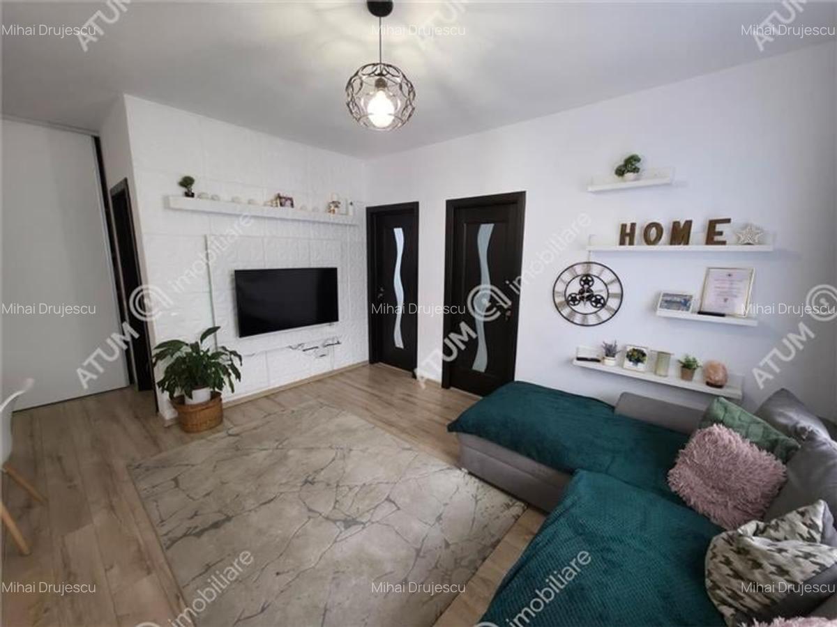 Apartament cu 3 camere si gradina 105 mp in Calea Cisnadie din Sibiu - 2