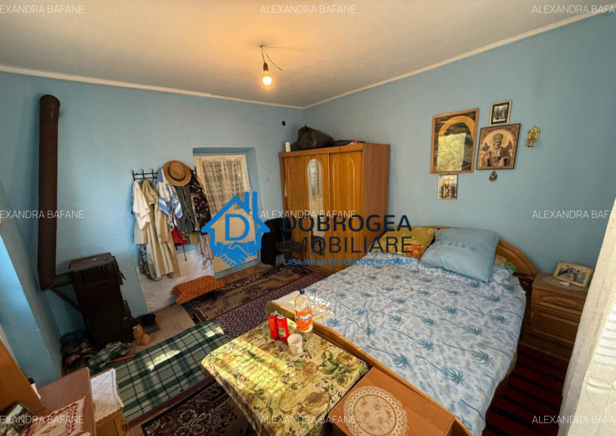 Caslita - teren 513 mp, pomi fructiferi, casa 2 camere - 5