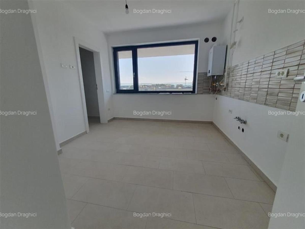 Apartament cu 3 camere decomandat în Tractorul - 7