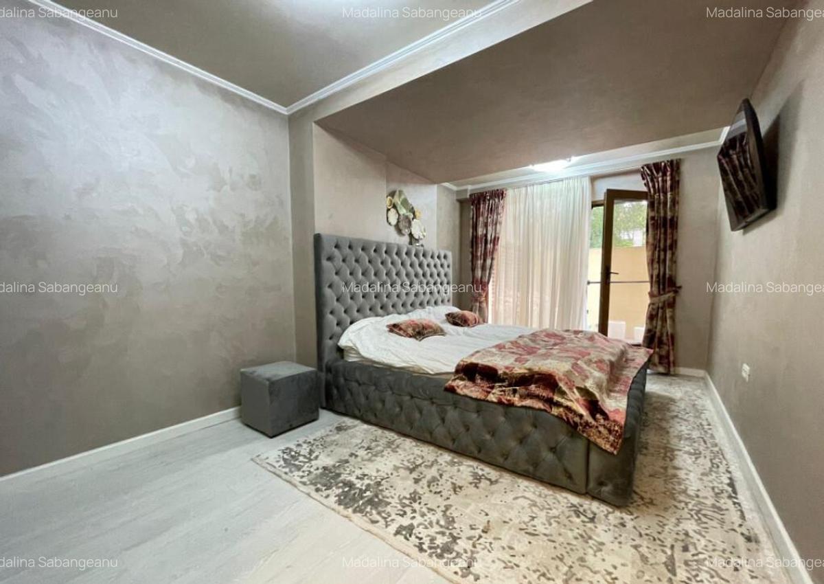 Apartament de 3 camere ?i curte privata - Parcare subteran - 10