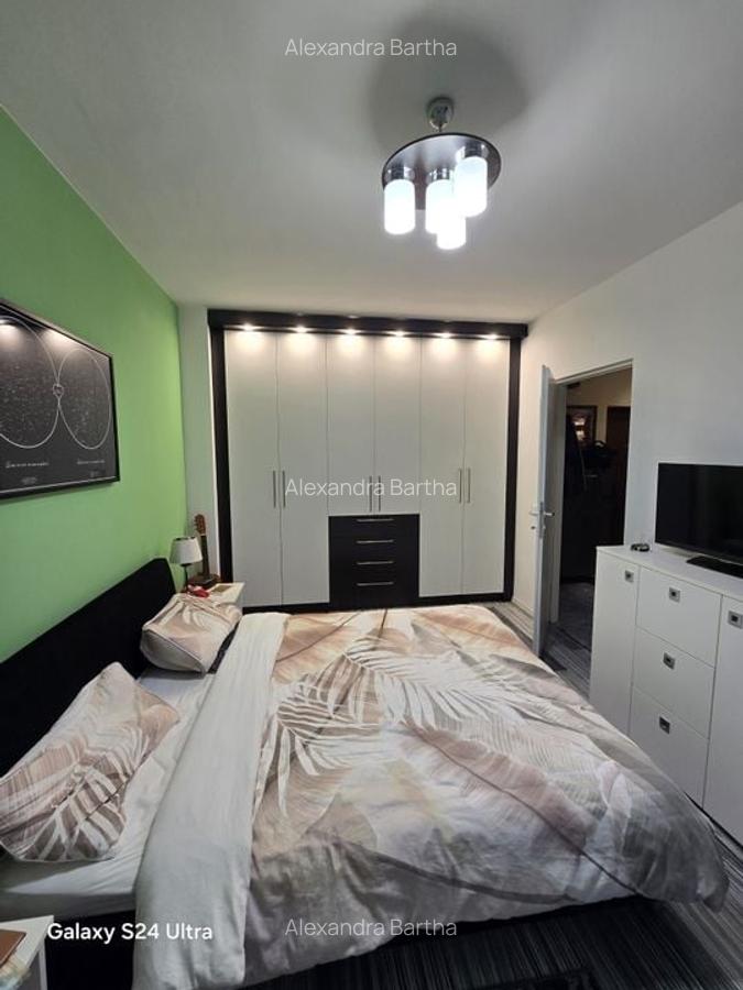 Apartament 2 camere ultrafinisat  cu gradina de 40 m2  zona Tautului - 12