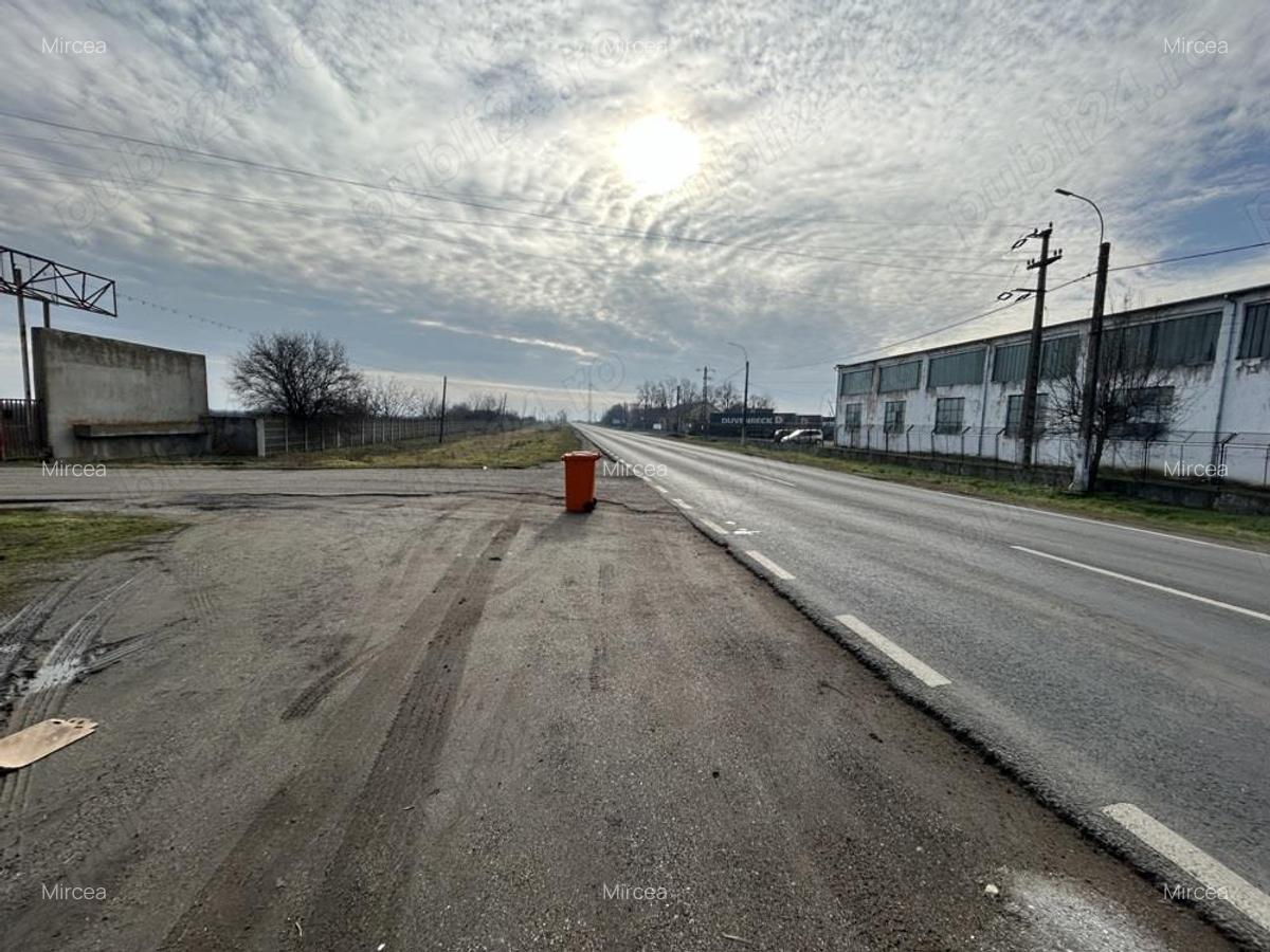 Vand teren intravilan,zona industriala,st.16,8 ha. + 8 ha.agricol,in Sanicolau Mare, la DN6,la sosea - 2