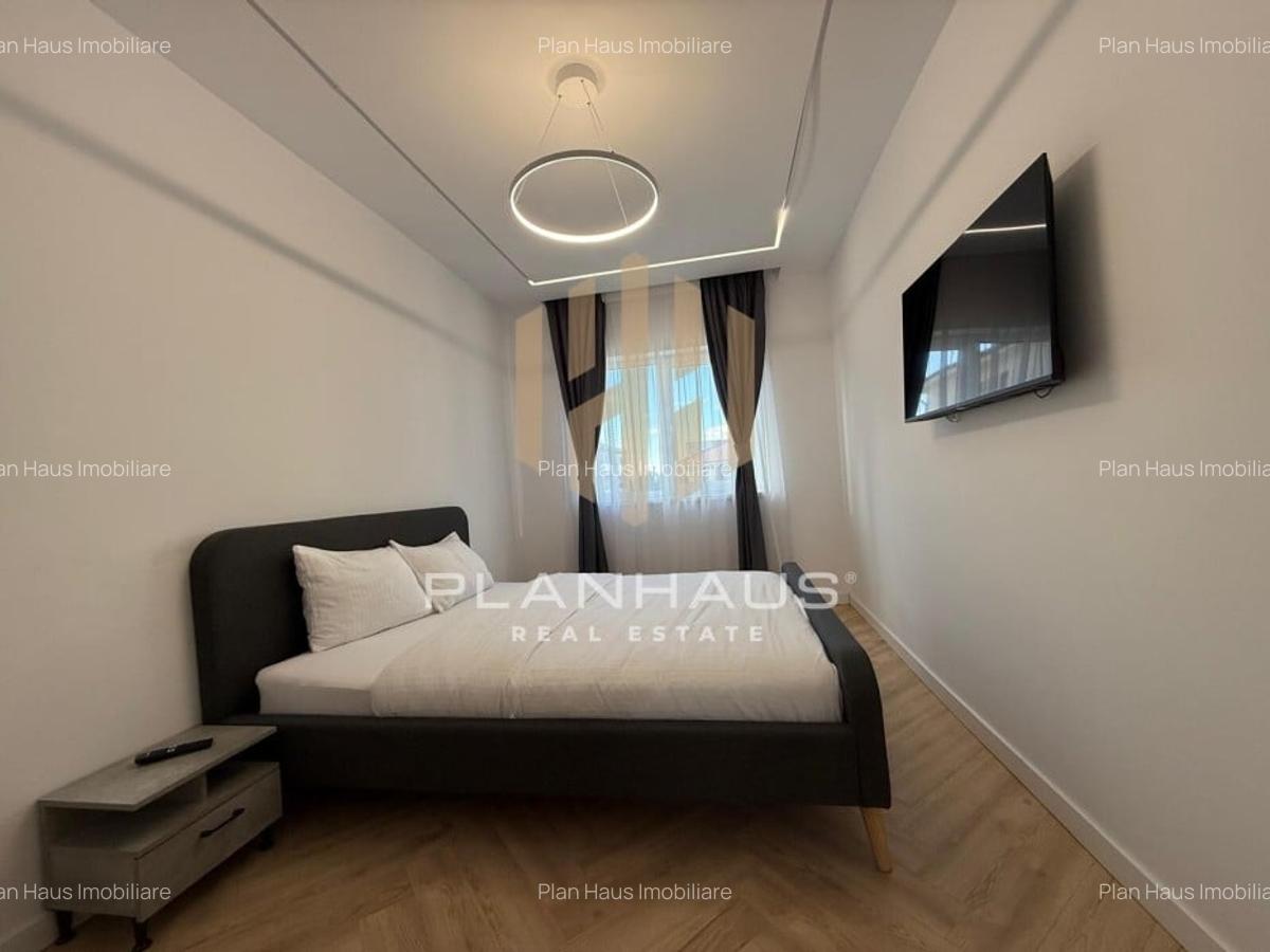 Inchiriere-ultramodern apartament zona rezidentiala ,3 camere,etaj 1,loc de parc - 11